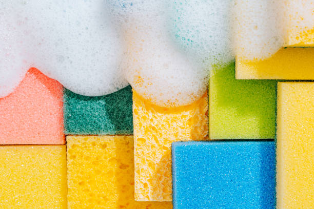 istock cleaning sponge background. sponges for cleaning different colors and different sizes 1447709229