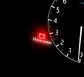 Battery warning light on car dashboard
