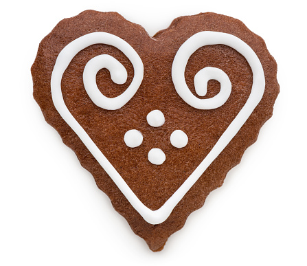 Gingerbread cookie. 
Heart shape. 
Isolated on white.