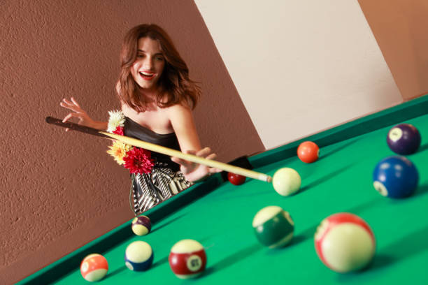 istock Woman bad in playing pool 1447713073