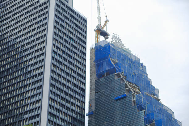Modern skyline and building under construction in Bangkok in area of Phloen Chit Road in downtown