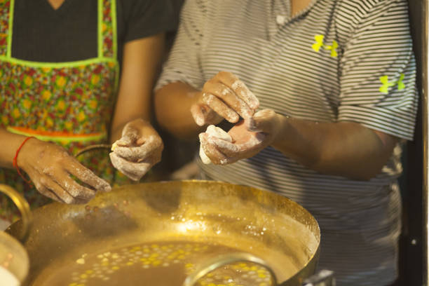 istock Thai women cooking on night market 1447729537