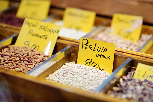Assorted organic beans and lentils sold on a marketplace in Genoa, Liguria, Italy
