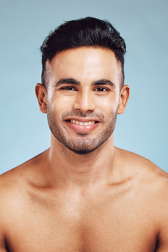Happy, face and man model with healthy skin, skincare and beauty with a smile. Portrait of a person from Portugal with body wellness, health and satisfaction about cosmetic wellbeing and happiness