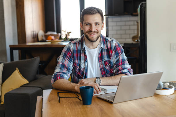 istock Portrait of a confident man working at home 1447750761