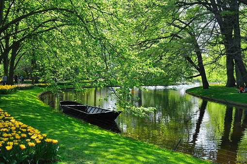 Boat near the river in Keukenhof park in Holland