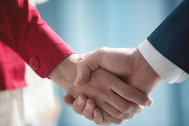 istock Shaking hands after a very pleasant encounter 1447760208