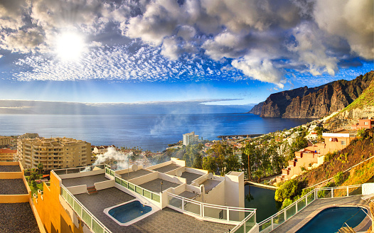 Swimming pools on hotel roof, Panorama in Los Gigantos, Tenerife, Canarian Islands