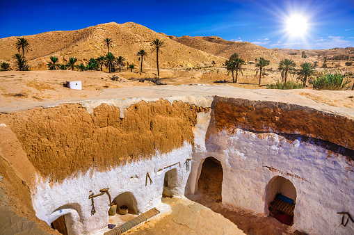 View of traditional berber bedouin house in Sahara desert in Tunisia.