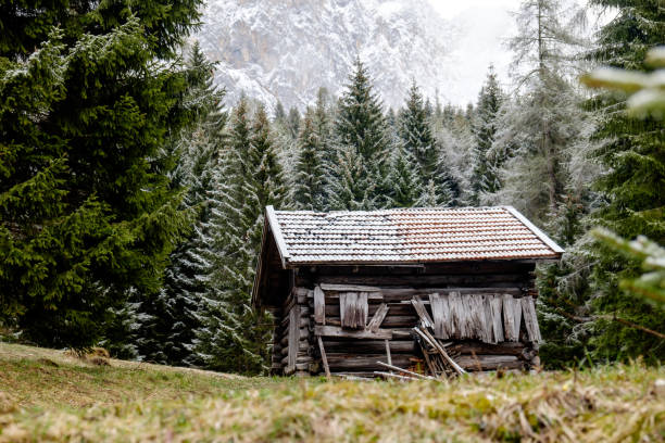 istock Old wooden hut in the mountain forest 1447768260