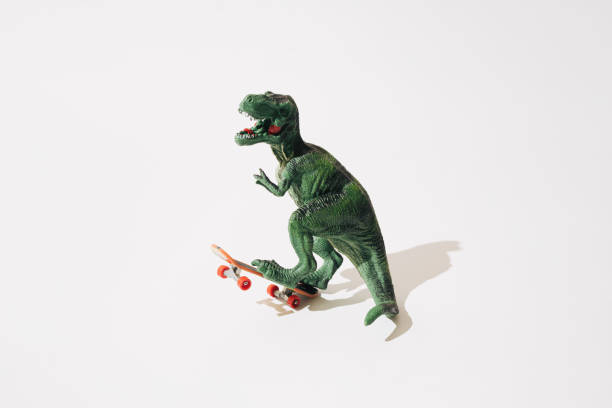 istock Tyrannosaurus rex on skateboard. White background. 1447769910