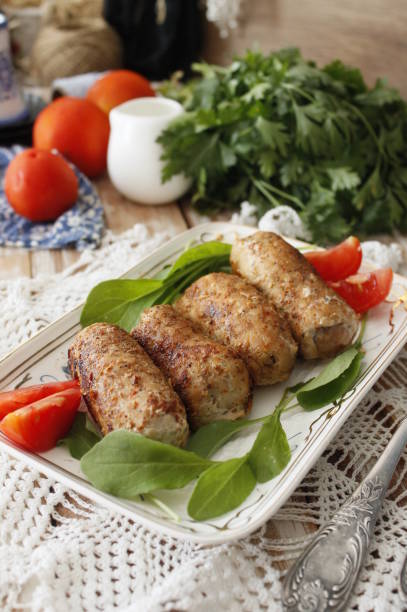 istock Festive appetizer. Meatloaf with mushrooms. 1447770630