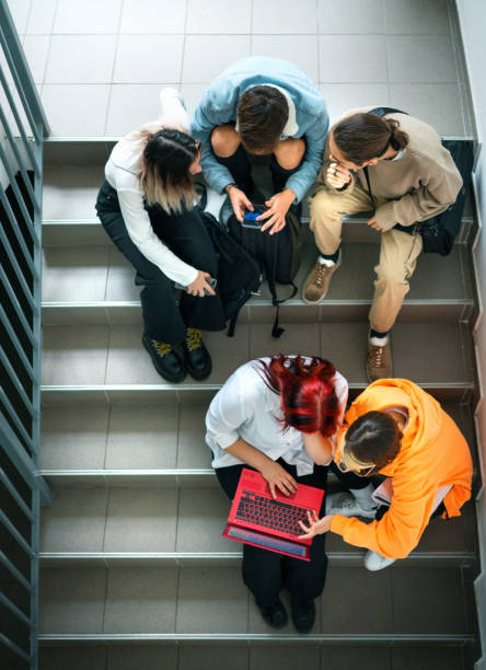 istock Highschool students on a break in  the hallway. 1447771942