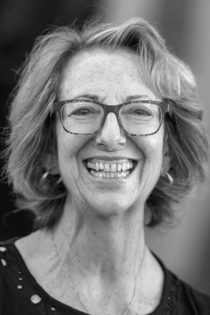 istock Smiling Senior Woman looking at the camera 1447774955