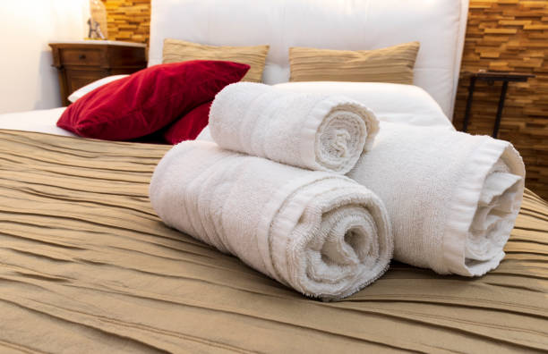 Set of towels Set of towels prepare for service customer on the bed in a hotel bedroom guest bathroom stock pictures, royalty-free photos & images