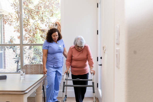 istock Physical therapist works with patient 1447776688