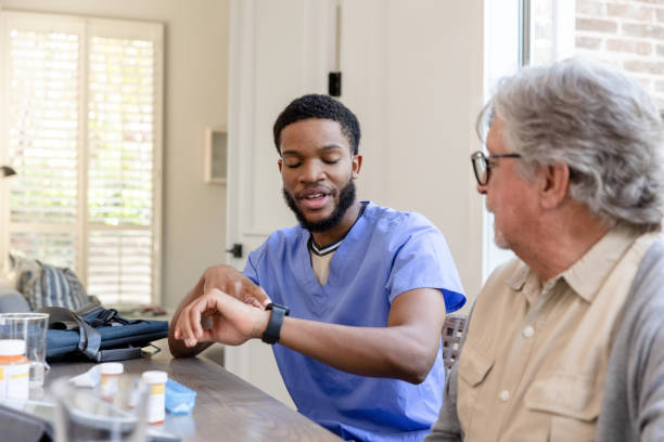 istock Nurse checks his watch 1447776735