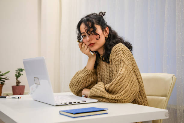 istock Woman working at home 1447777167