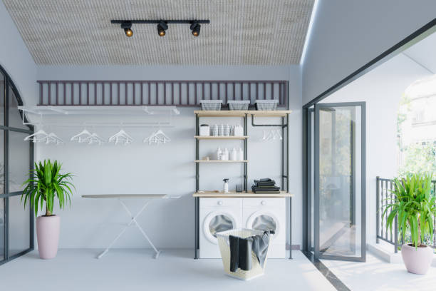 istock Interior Of Laundry Room With Washing Machines And  Ironing Board 1447780086