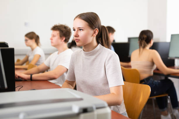 istock Teenage girl using computer during lesson 1447780789