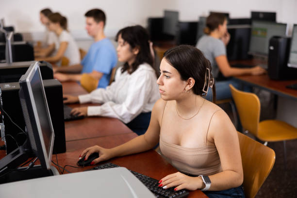 istock Teenage girl using computer during lesson 1447782679