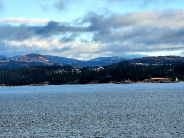 istock Mountains and water at sunrise 1447783578