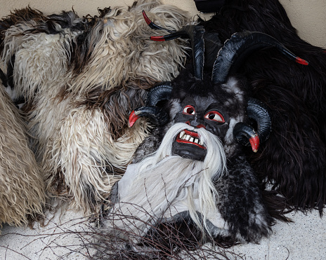 Dark portrait of a person wearing a wolfman halloween costume.