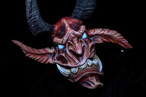 Mask of krampus, christmas devil, legendary figure of fairytale procession in alpine regions, austria, germany, italy. High quality photo