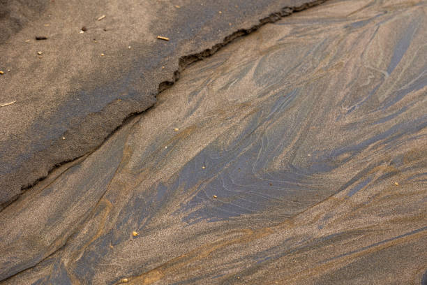 istock Sand texture, black, atlantic ocean, Azores islands. 1447787685