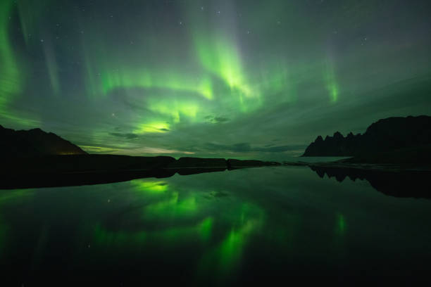 istock Northern lights reflection at Tungeneset viewpoint, Senja, Norway 1447789882