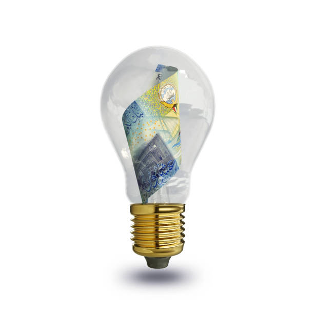 istock 3d rendering of Kuwaiti dinar note inside transparent light bulb isolated on white background, creative thinking. Making money by solving problem. idea concept 1447789943
