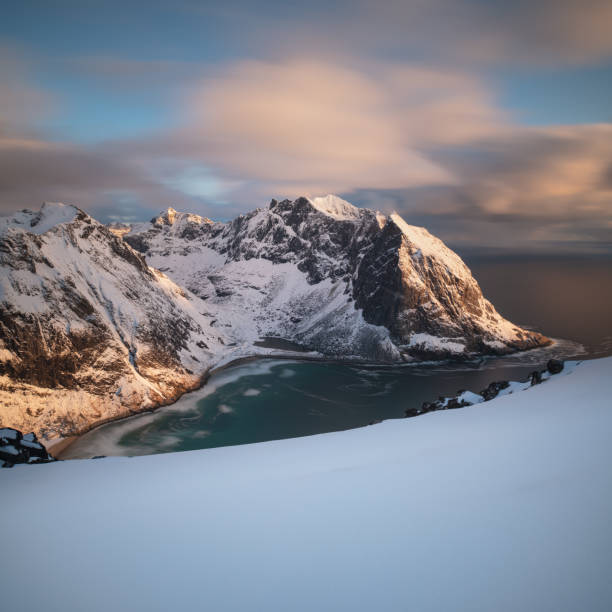 istock Kvalvika beach with snow, Lofoten Islands, Norway 1447789994