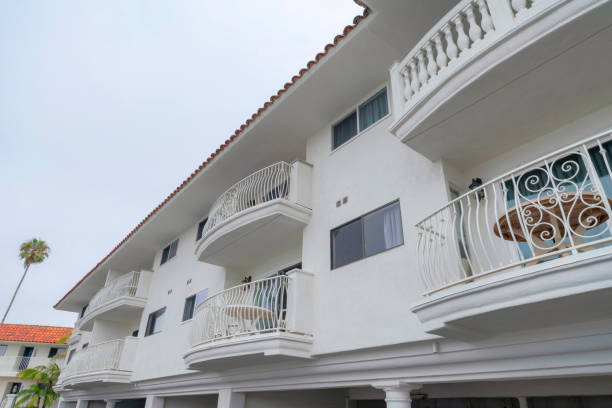 istock White mediterranean style apartment building at Oceanside, California 1447794071