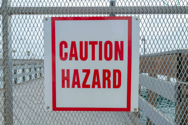 istock Caution Hazard sign on a metal wire rails at Oceanside, California 1447794291