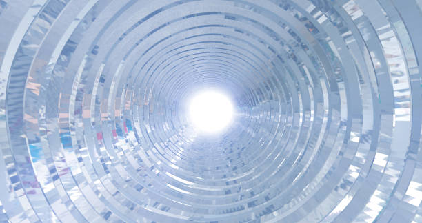 ilustraciones, imágenes clip art, dibujos animados e iconos de stock de un túnel brillante de metal plateado giratorio con paredes de costillas y líneas en forma de círculo con reflejos de rayos luminosos. antecedentes abstractos - circle swirl target aspirations
