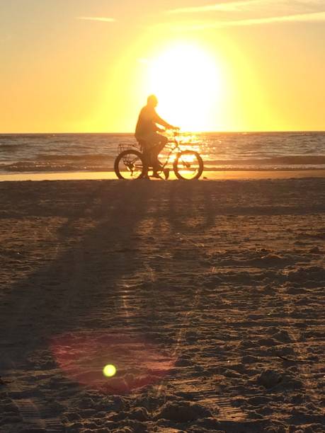 istock Beach Sunset with Bike 1447797460