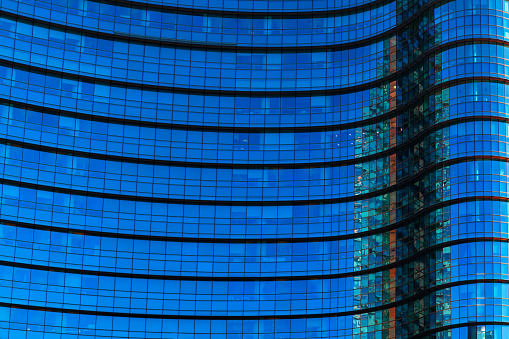 Architecture with blue glass . Skyscraper windows background