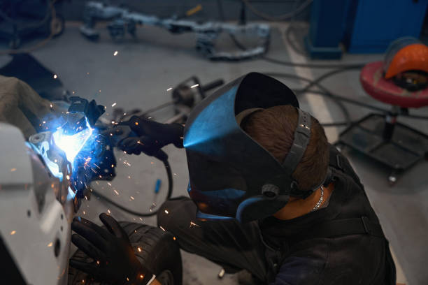 istock Professional welder working in the welding shop 1447801957