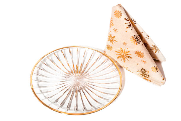 istock Christmas gold decor plate with christmas tablecloth 1447804566