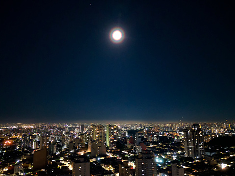 Aerial view of the city of São Paulo on a full moon night