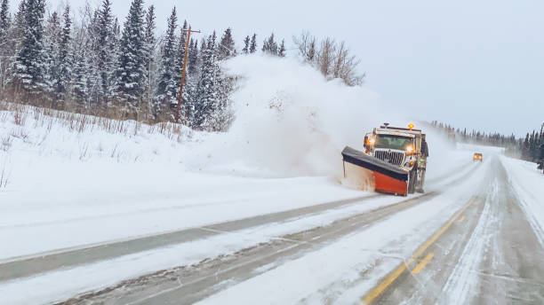 istock Snowplow on Winter Road in Alaska 1447809966
