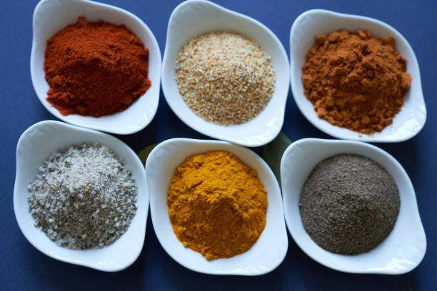 istock Spices close-up on blue background. 1447811693