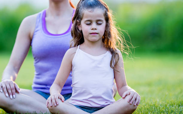 istock Mother Daughter Meditation 1447817412