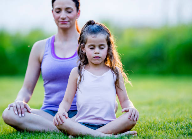 istock Mother Daughter Meditation 1447817422