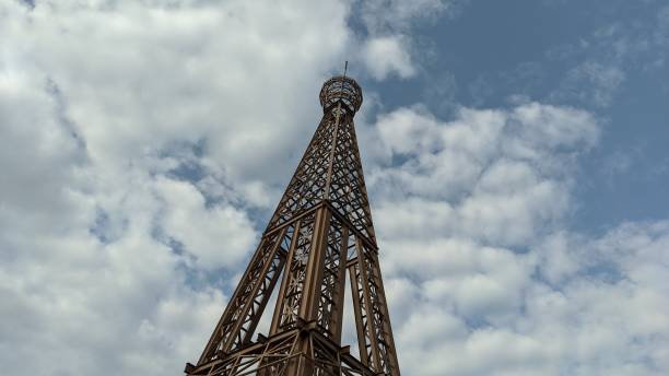 istock An iron tower that looks tall against a clear sky in the background 1447820096