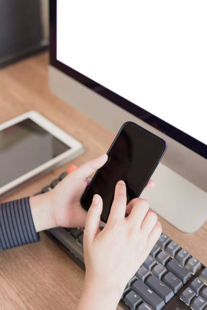 istock Asian women work at home and use computers and other digital devices 1447820842
