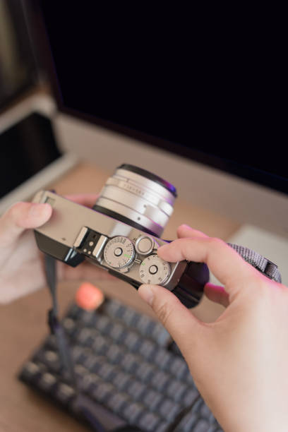 istock Asian women work at home and use computers and other digital devices 1447820874