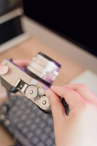 istock Asian women work at home and use computers and other digital devices 1447820878