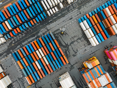 Drone close view of cargo shipping containers.