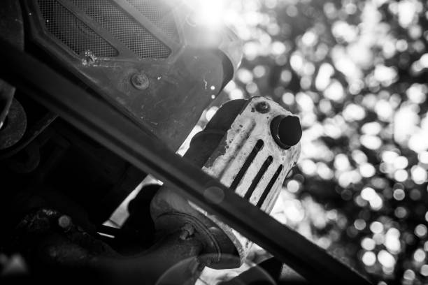 black and white close-up detail of a car headlight